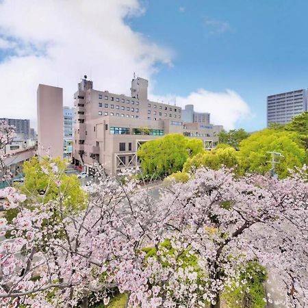 Minamisenri Crystal Hotel Suita Buitenkant foto