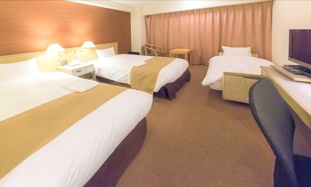 Minamisenri Crystal Hotel Suita Buitenkant foto