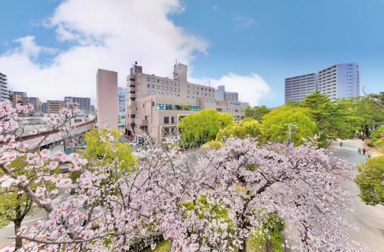 Minamisenri Crystal Hotel Suita Buitenkant foto